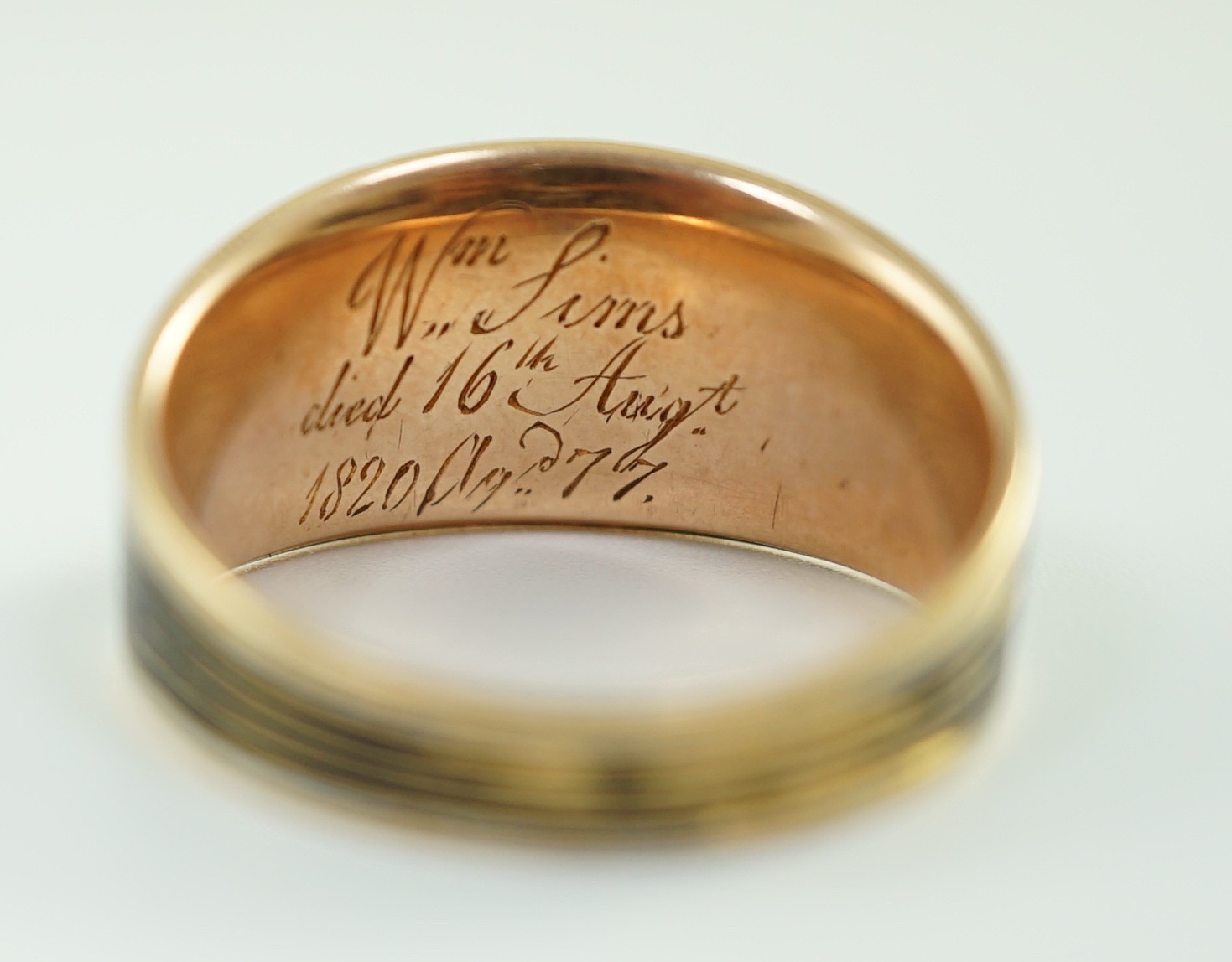 A George IV gold and two colour enamel mourning ring